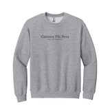 Represent your Gamma Phi Beta sorority with this classic Gildan crewneck sweatshirt. Your cherished ΓΦΒ Wordmark expertly embroidered on the chest in black for a prominent and lasting display.