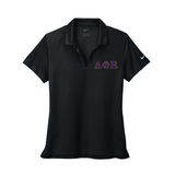 Delta Phi Epsilon Sorority Nike Ladies Dri-FIT polo with embroidered Greek letters