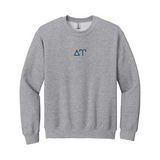 Represent your Delta Upsilon principles with sharp, classic style in this Gildan crewneck sweatshirt. It showcases your distinctive ΔΥ Greek letters meticulously embroidered on the center chest in gold and royal blue.