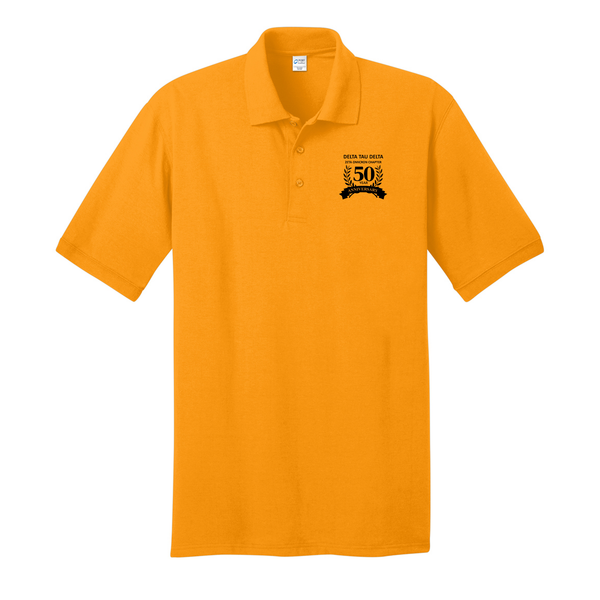 Custom embroidered Delta Tau Delta 50 year anniversary Port &amp; Company gold polo. High quality embroidery located on the left chest to commemorate the 50 year anniversary of Delta Tau Delta at the University of Central Florida.&nbsp;