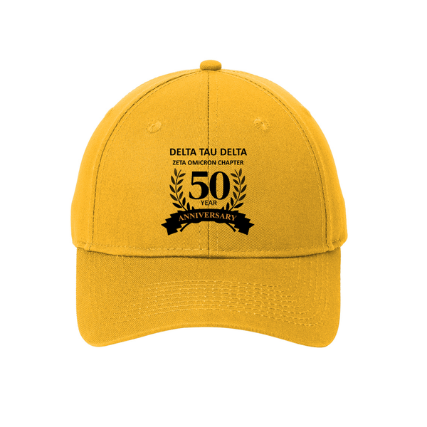 Custom embroidered Delta Tau Delta 50 year anniversary Port &amp; Company 6 Panel Twill Hat. The hat comes in gold, with the 50 Year Anniversary design embroidered in black. High quality embroidery located on the left chest to commemorate the 50 year anniversary of Delta Tau Delta at the University of Central Florida.&nbsp;